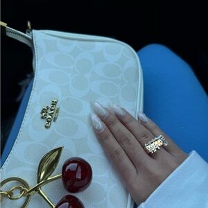 Coach White and Gold Handbag with Cherry Charm